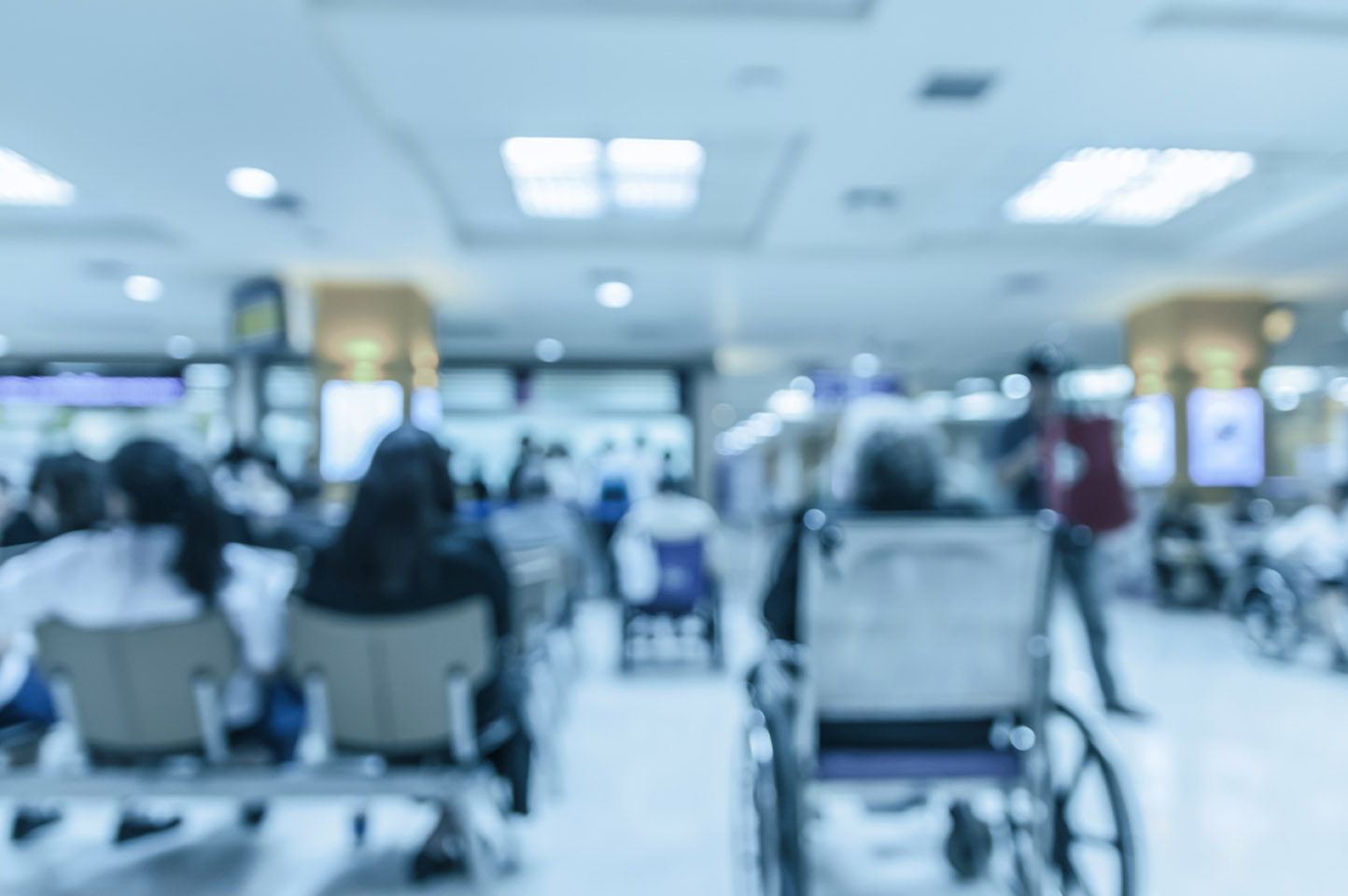 Abstract photo blurred of hospital background, Patient sitting chair with waiting seat for see doctor.